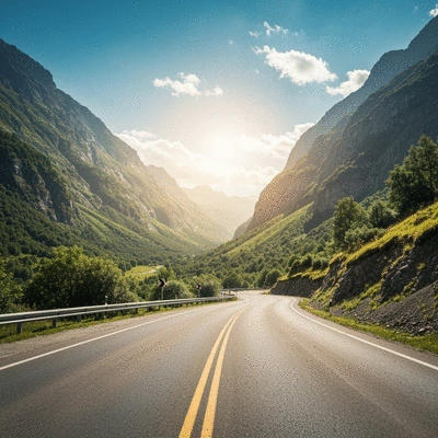 Scenic view of a winding road through mountains, symbolizing freedom and adventure of a road trip, no text, no words, no typography, 8K